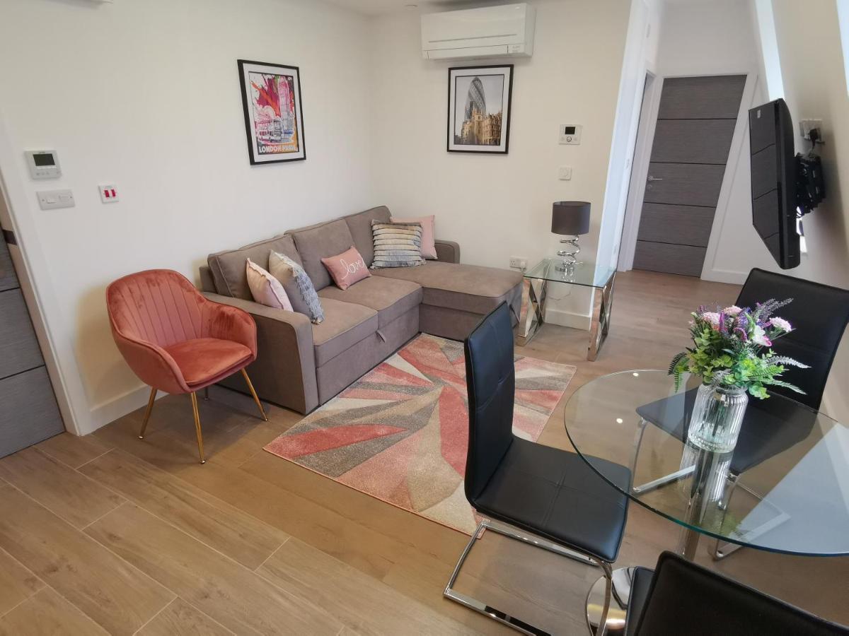 콜링엄 프라임 아파트먼트 런던 외부 사진 A living room in a serviced apartment in London