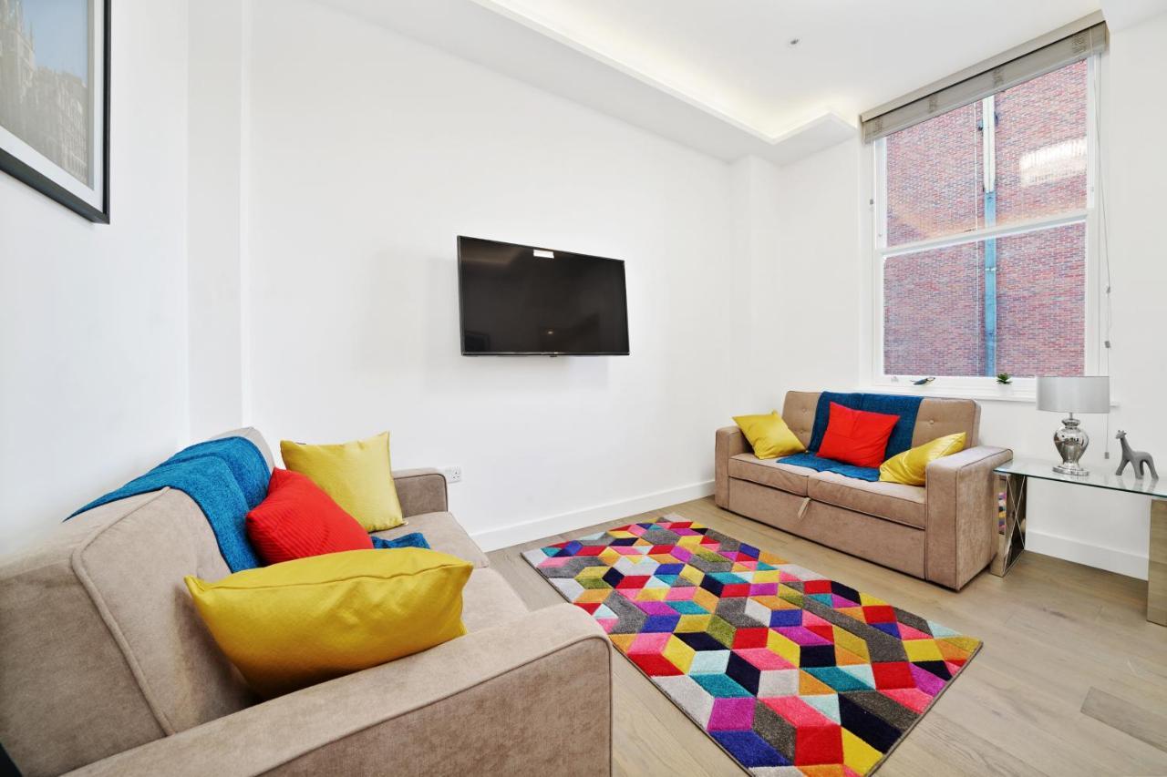 콜링엄 프라임 아파트먼트 런던 외부 사진 A living room in a serviced apartment in London