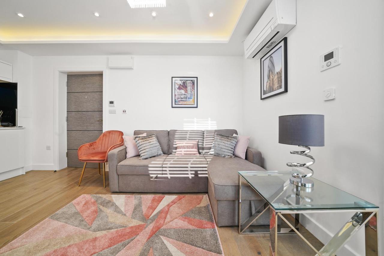 콜링엄 프라임 아파트먼트 런던 외부 사진 A living room in a serviced apartment in London